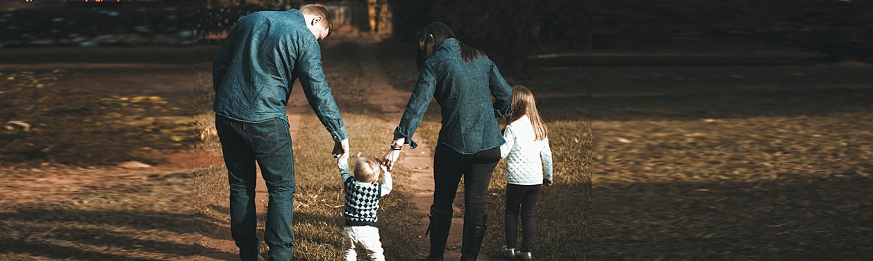 A family holding hands.
